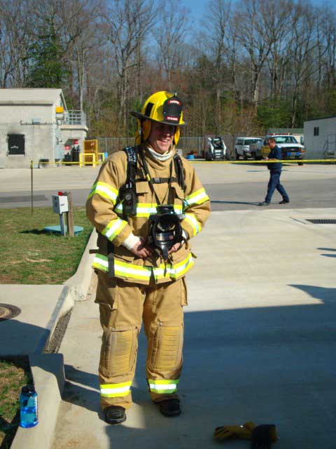 Attorney Mark Dix in firefighter uniform